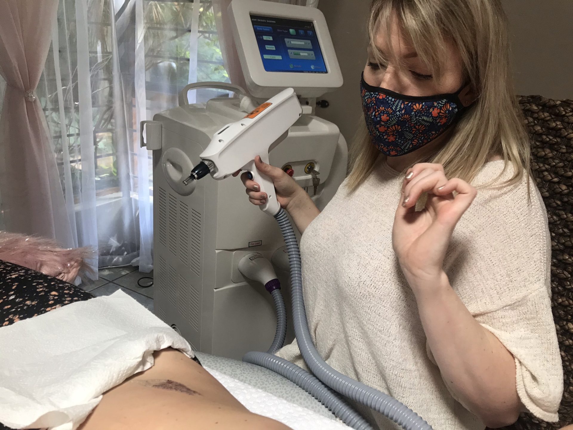 Trainer and student during personalised aesthetic training in South Africa