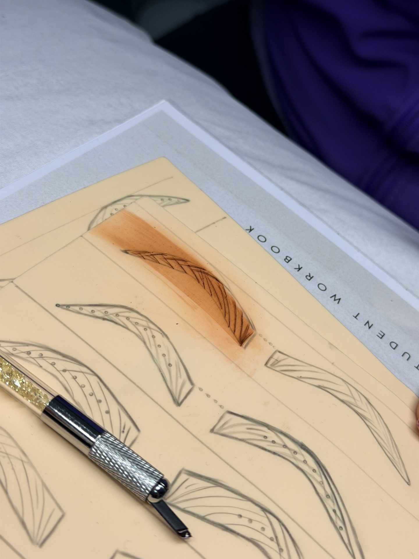 Hands-on permanent makeup training with real-world practical application at NDI Aesthetics Academy